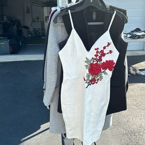 White dress with flowers. Floral dress